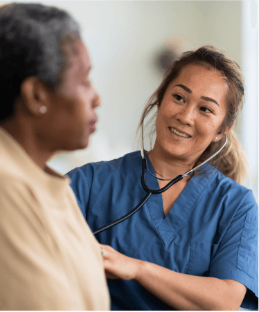 An Optum WA healthcare professional providing personalized medical care