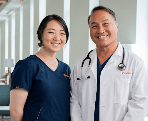 Two smiling Optum doctors